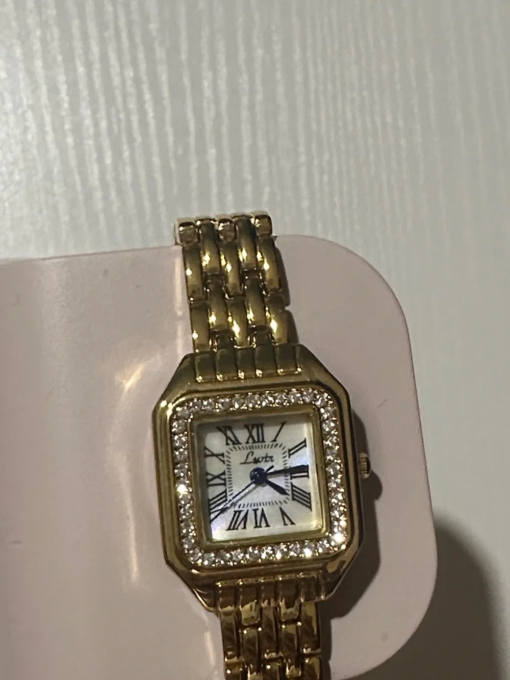 Elegant Gold-Tone Women's Crystal Bezel Watch with Blue Hands